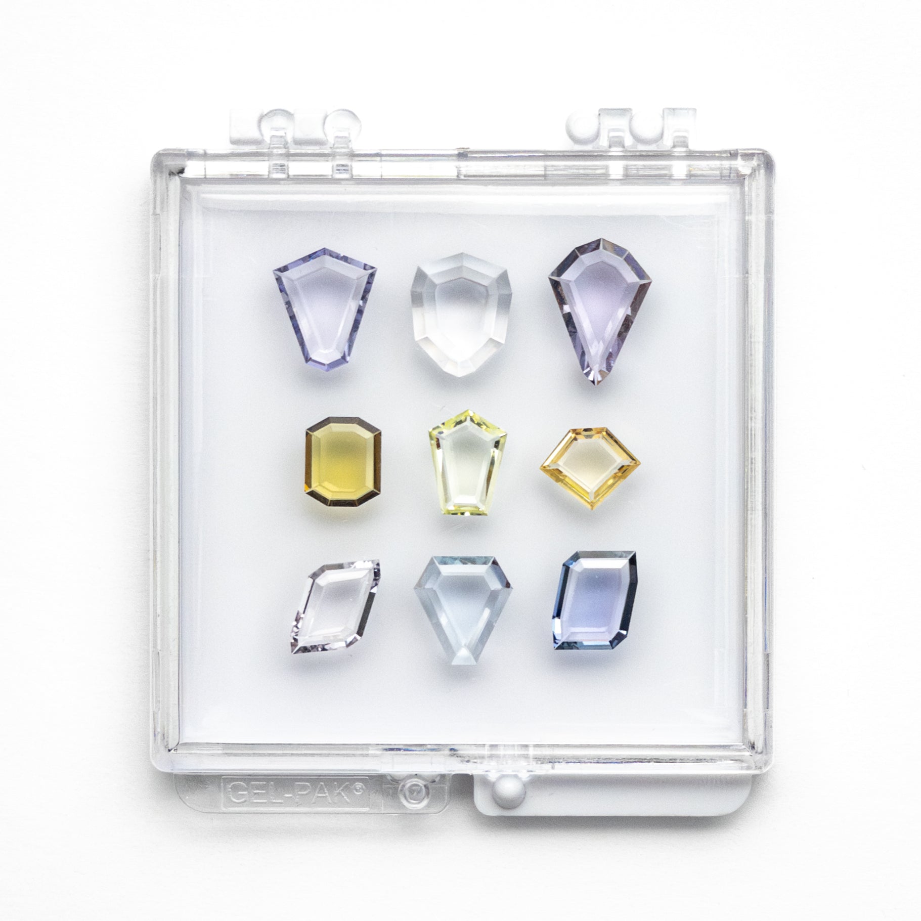 10.70cttw 9pc Geometric Portrait Cut Sapphire Parcel 23794-00