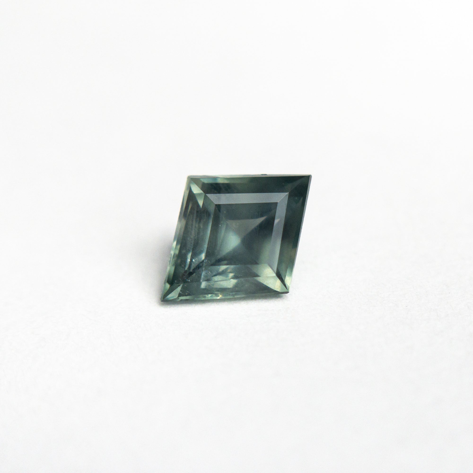 0.75ct 7.52x5.89x3.35mm Lozenge Step Cut Sapphire 25175-16